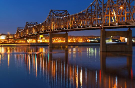 Peoria bridge in nighttime setting.